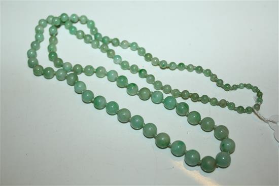 Single strand graduated jadeite bead necklace, 29.5in.(-)